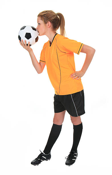 istock Yellow Soccer Player Kiss the Ball 184833541