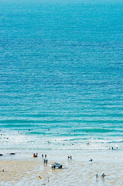 istock Surfers At Porthtowan Beach Cornwall UK 184833927