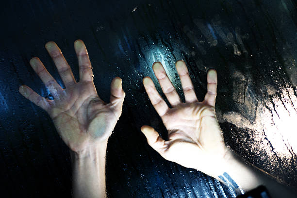 istock Female hands against a condensed window 184834878