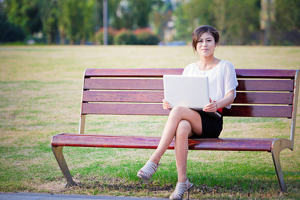 istock chinese businesswoman use laptop 184834992