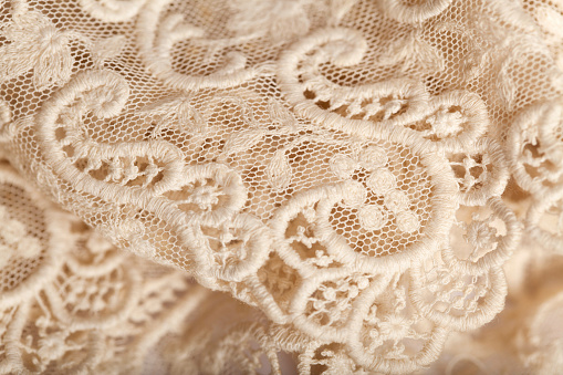 Close-up of an off white lace piece of material