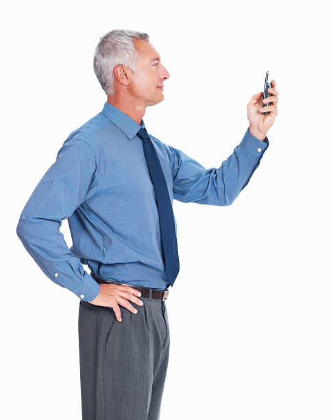 istock Business man looking at phone 184835576