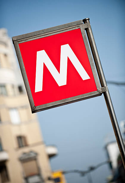 istock Milan Metro Sign with apartment building in background 184835590