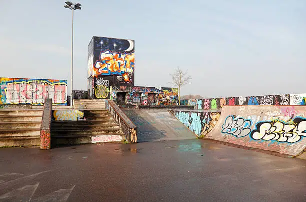 Colorfull graffiti and skateboard ramps.