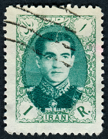 Cancelled Stamp From Iran Featuring The Shah Of Iran Who Led The Country From 1941 Until 1979.