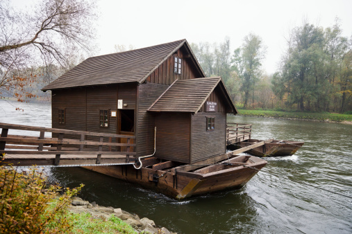 Floating wooden mill on river Mura, Izakovci, Slovenia.