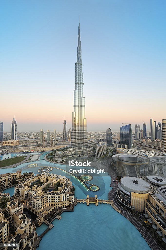 Stunning dubai This is a very rare capture of burj khalifa and downtown dubai city in the first light morning with the fountain lights. Dubai Stock Photo