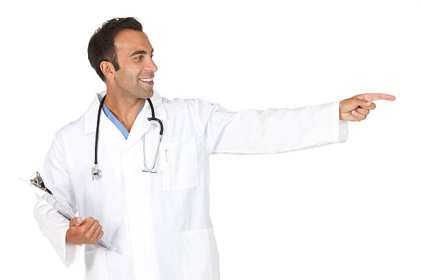 istock Male doctor holding a clipbooard and pointing 184837135