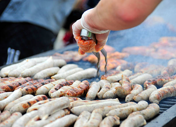 istock Many sausages at barbecue grill 184837254