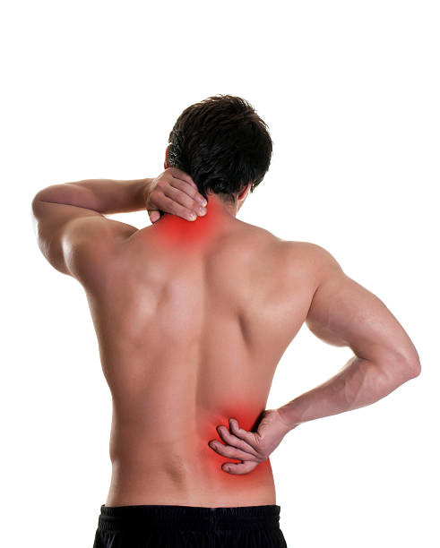 istock A man puts his hands on red spots on his back 184837323