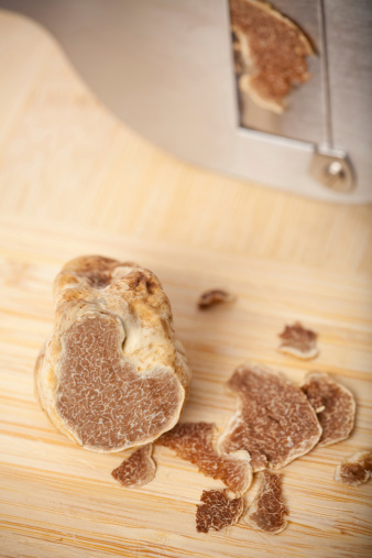 close-up of single truffle and slicessimilar & more truffles in: