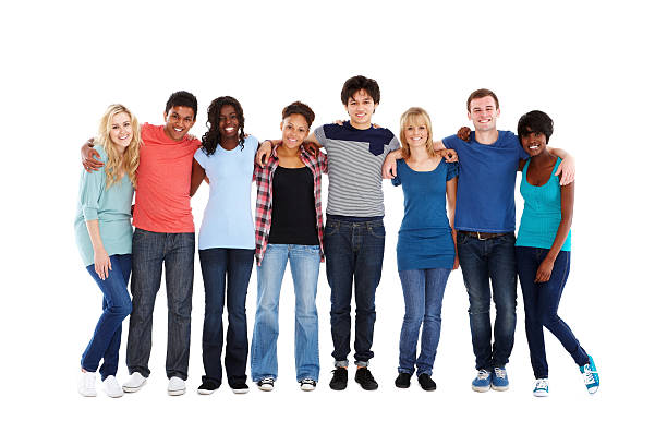 Teenage Friends Standing Together Multi-ethnic group of teenagers stand in a row with arms around one another. Horizontal shot. teenagers only stock pictures, royalty-free photos & images