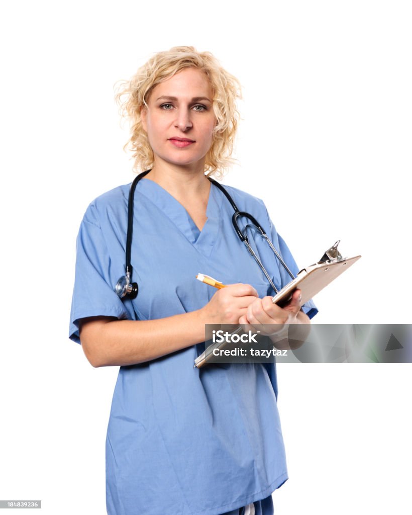 Asistente de enfermera tomar notas - Foto de stock de Adulto libre de derechos