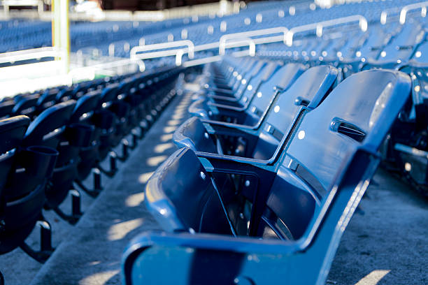 Stadium Seats Rows of chairs at a sporting venue. baseball stadium chairs stock pictures, royalty-free photos & images