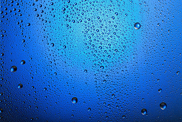 istock Night blue water drops background   Raindrop on the window glass 184839656