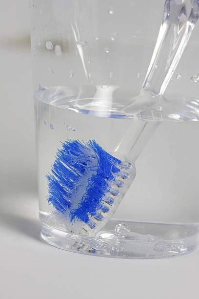 istock Toothbrush in a Glass of Water 184839902