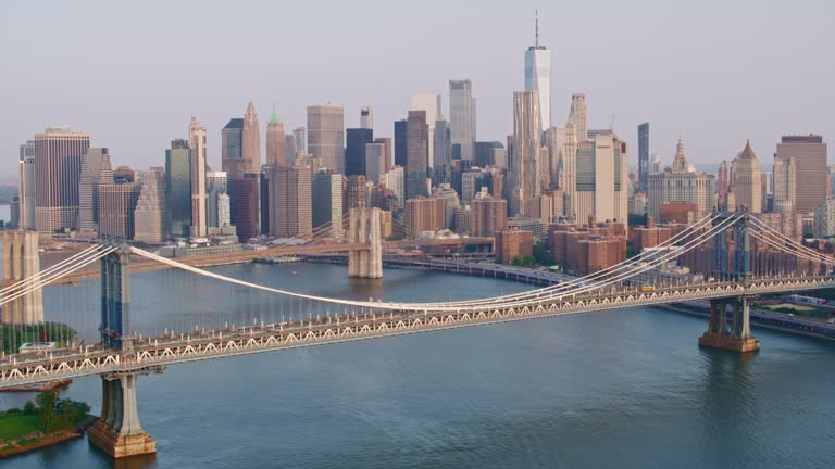 AERIAL East River in NYC and the Brooklyn and Manhattan Bridge