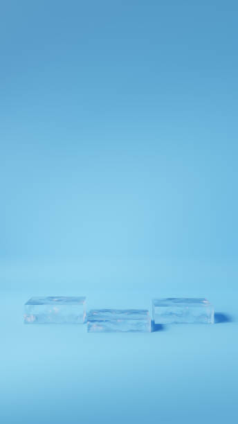istock 3D Illustration.Three square ice pedestals on light blue background.(Vertical) 1848414664
