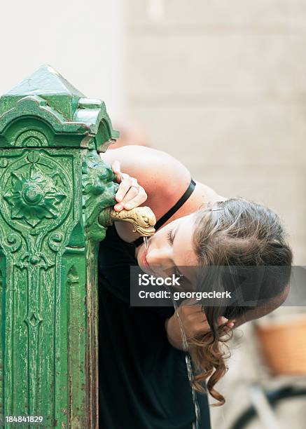 Drinking From A Water Fountain Stock Photo - Download Image Now - Adult, Adults Only, Beautiful People
