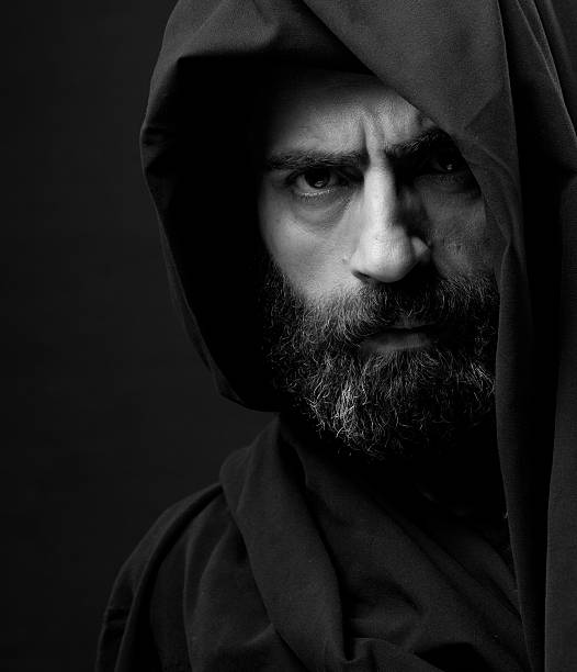 istock Serious man with beard and hood 184843080