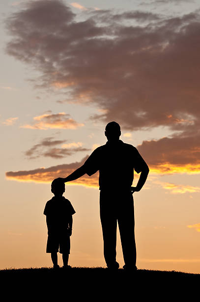 istock Father and Child Silhouette 184843234