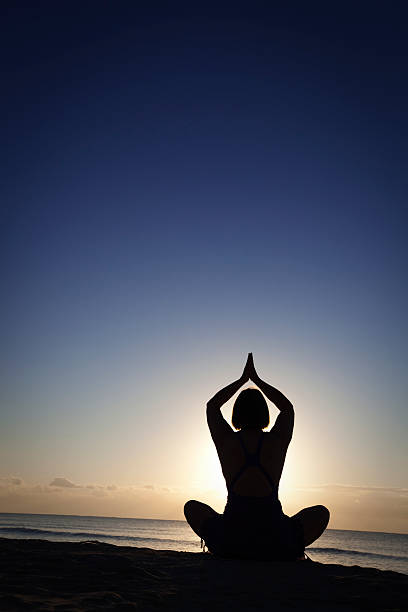 istock Woman Practicing Yoga Poses in Nature 184843327