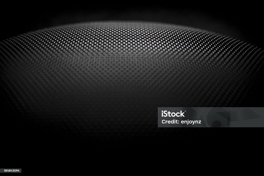 Speaker grille Black metal speaker grille with very shallow depth of field. Speaker Stock Photo