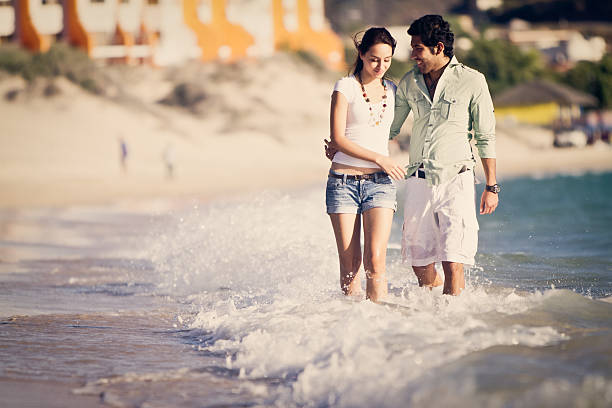 istock Young Couple on the Beach 184843939