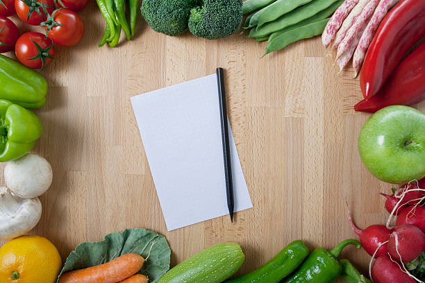 istock Healthy Organic Vegetables on a Wooden Background 184844159