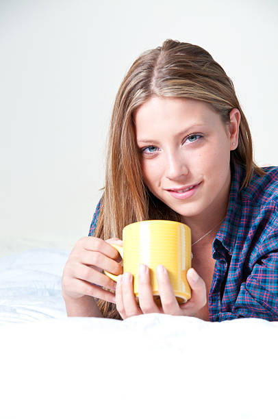 istock At Home Series - Holding a Cup of Coffee 184844230