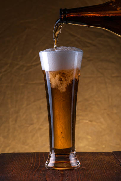 istock Pour the beer into the glass 1848449926