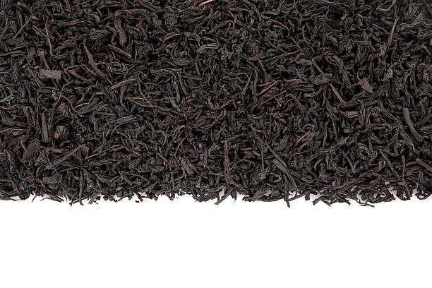 foglie di tè nero - dry tea foto e immagini stock