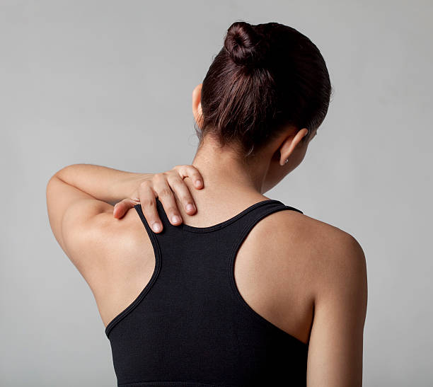 istock Young woman with neck pain 184846038