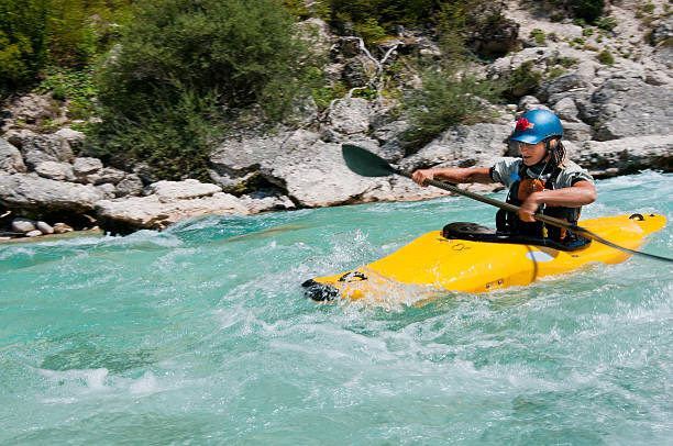 istock Women kayaking on turquoise mountain river 184846311