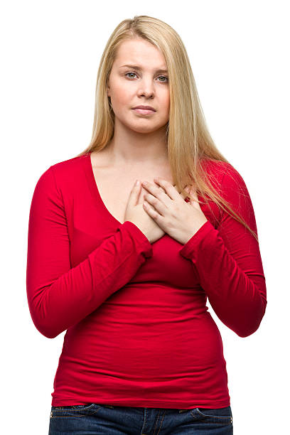 istock Young Woman With Hands on Chest 184846359