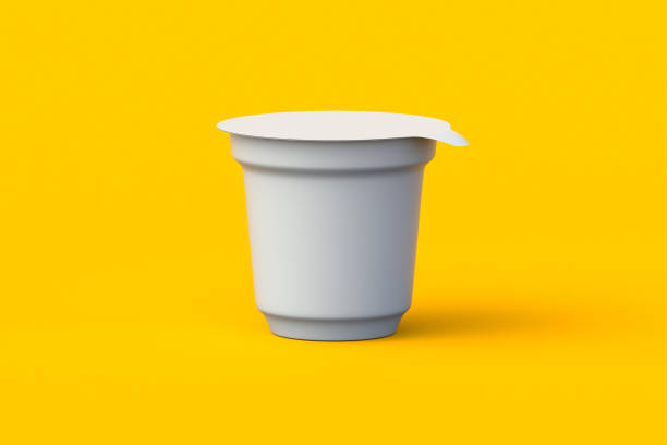 istock Packaging for dairy products. Plastic container for yoghurt, dessert or cheese on orange background. Blank disposable jar for ice cream. 3d render 1848463792