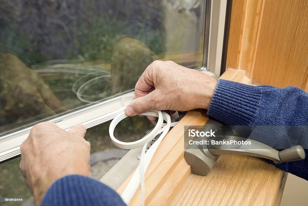 Window Weather Seal Application  Insulation Stock Photo
