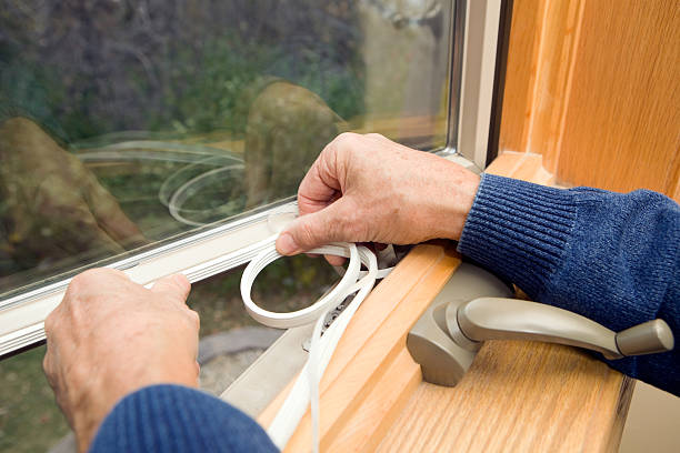 Window Weather Seal Application  insulation stock pictures, royalty-free photos & images
