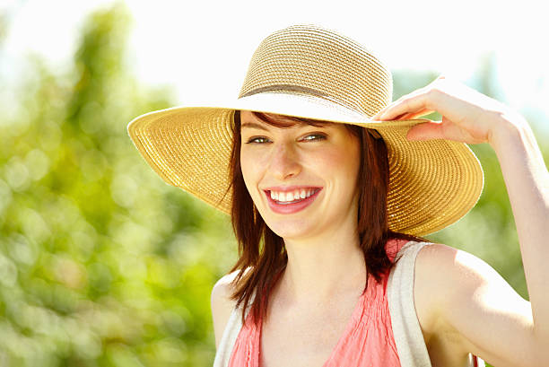 istock Beautiful young woman wearing hat 184846455