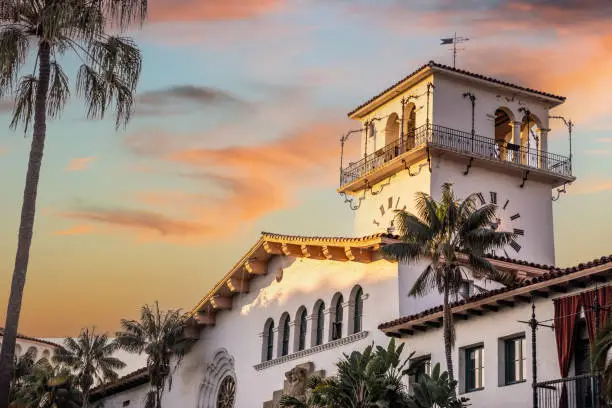 Santa Barbara's historic county courthouse on Anacapa Street as the early morning sunrises over the Pacifica Ocean.
