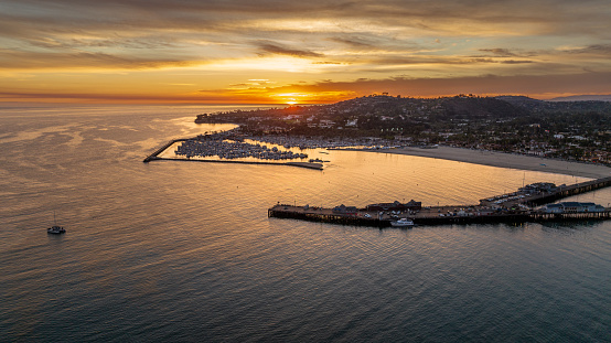 Aerial view of Santa Barbara as the sun sets. Santa Barbara is the county seat and is a popular tourist and resort destination, nicknamed the American Riviera.