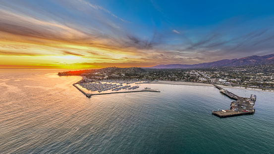 Aerial view of Santa Barbara as the sun sets. Santa Barbara is the county seat and is a popular tourist and resort destination, nicknamed the American Riviera.