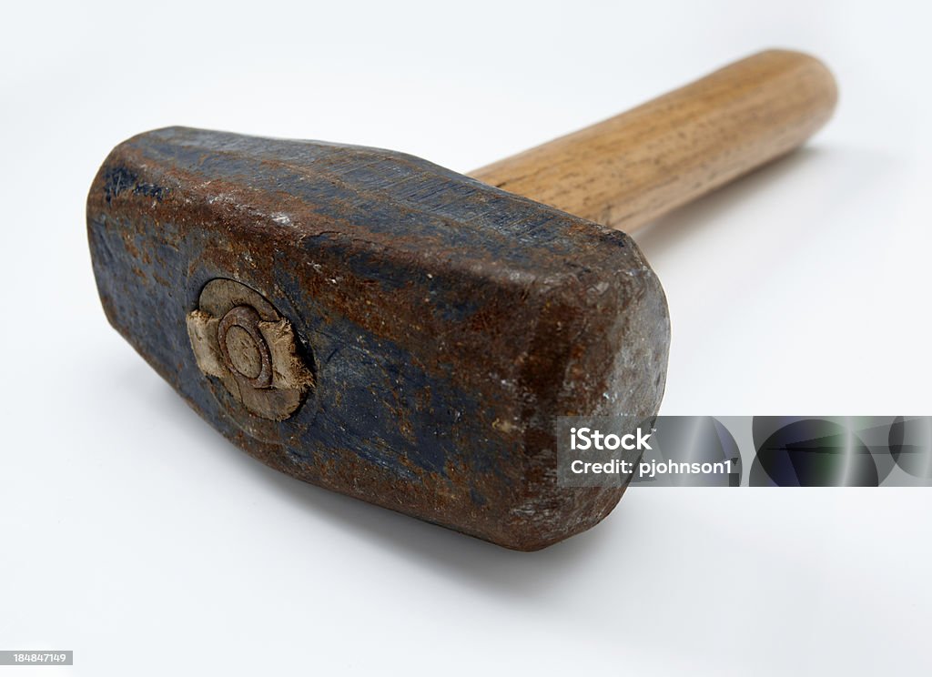 Mallet Weathered mallet shot with forced perspective on white background. Sledgehammer Stock Photo