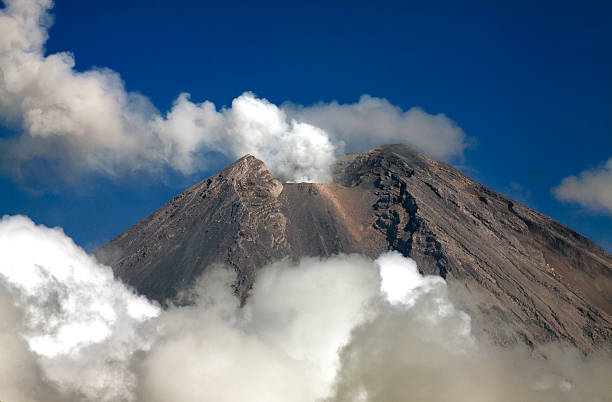 Mount Semeru eruption. "Semeru is a volcano located in East Java, Indonesia. It is the highest mountain on the island of Java." bromo tengger semeru national park stock pictures, royalty-free photos & images