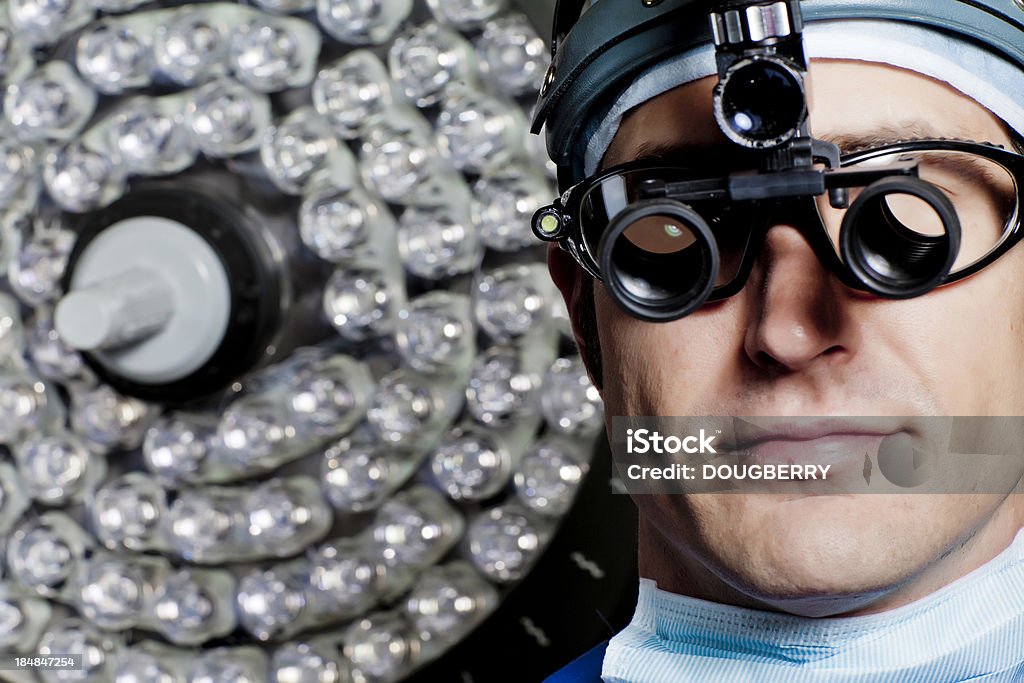 Surgeon with Magnified glasses Hospital Clinic Doctor surgeon with specialty magnifiers on his glassesPlease see similar images in my portfolio: 35-39 Years Stock Photo