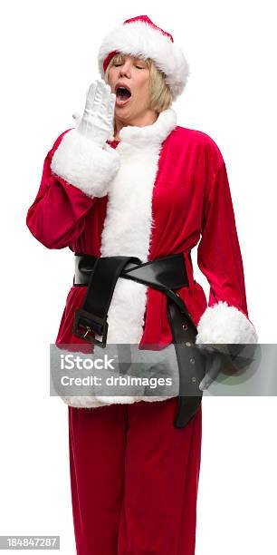 Yawning Santa Woman Stock Photo - Download Image Now - 50-59 Years, 55-59 Years, Adult