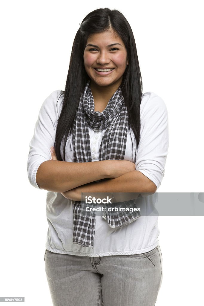 Smiling Young Woman Crosses Arms Portrait of a young woman on a white background. White Background Stock Photo