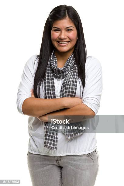 Smiling Young Woman Crosses Arms Stock Photo - Download Image Now - White Background, Teenager, Smiling