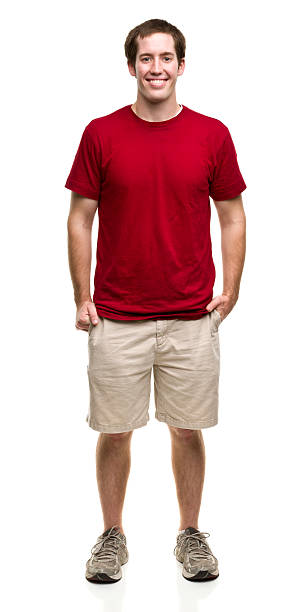 Standing Young Man Portrait of a man on a white background. http://s3.amazonaws.com/drbimages/m/aa.jpg short sleeved stock pictures, royalty-free photos & images