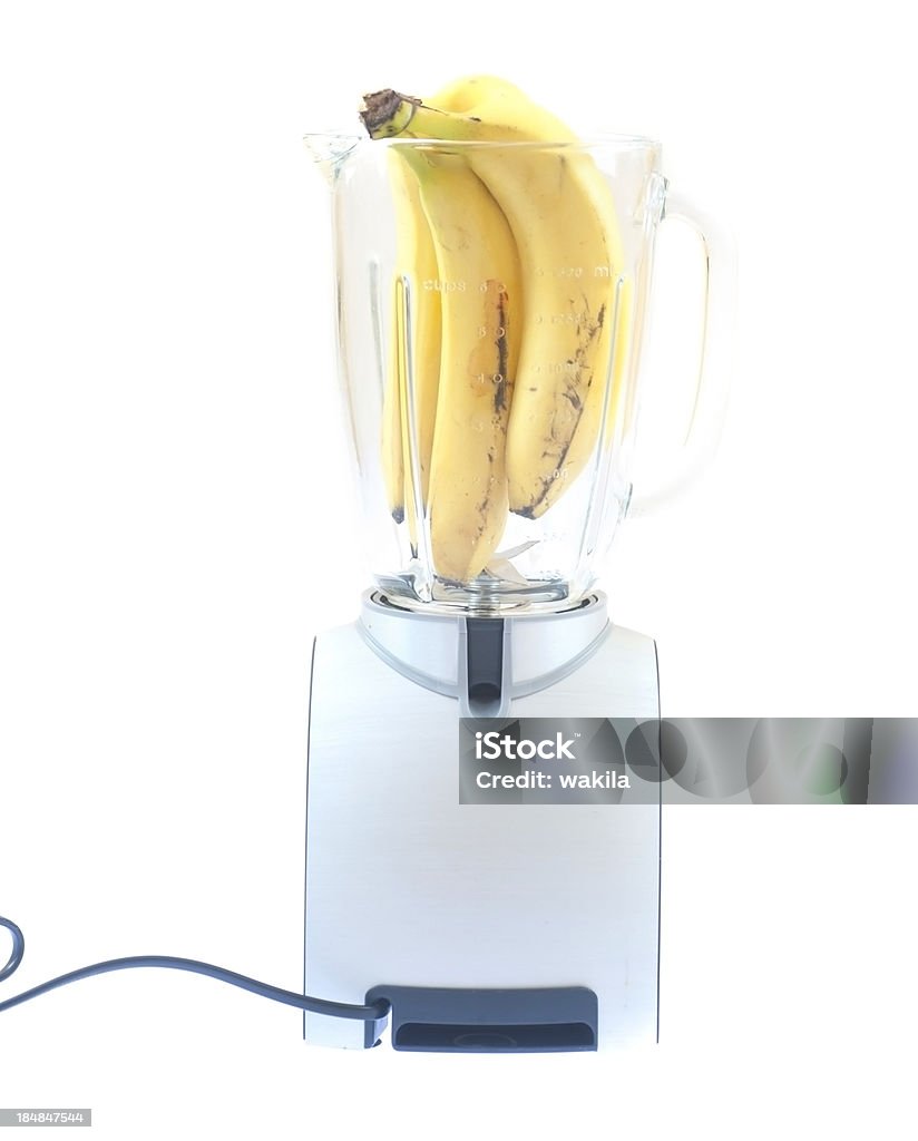 mixer with banana bananas in mixer isolated on white Appliance Stock Photo